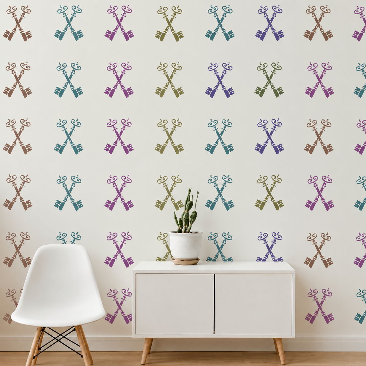 Antique Keys Stencil featuring colorful crossed keys in teal, purple, olive green and brown on a white wall.