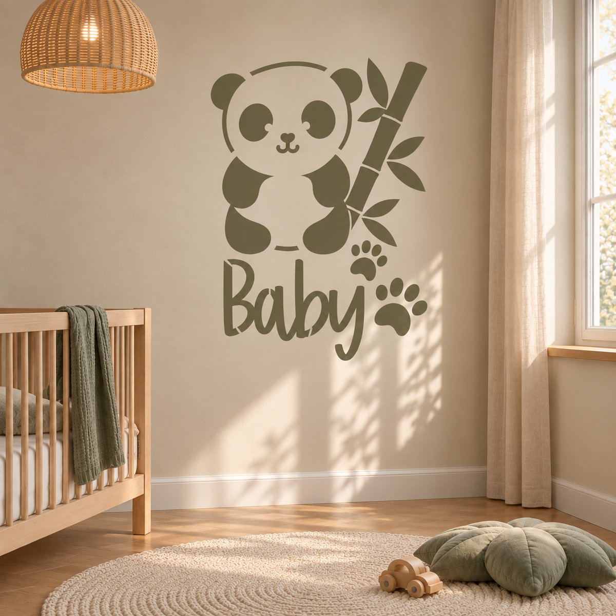 Sage green baby panda wall stencil with bamboo and paw prints in a natural nursery.