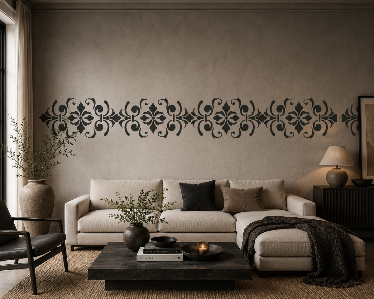 Baroque damask pattern stencil creating an elegant ornamental border across a neutral living room wall