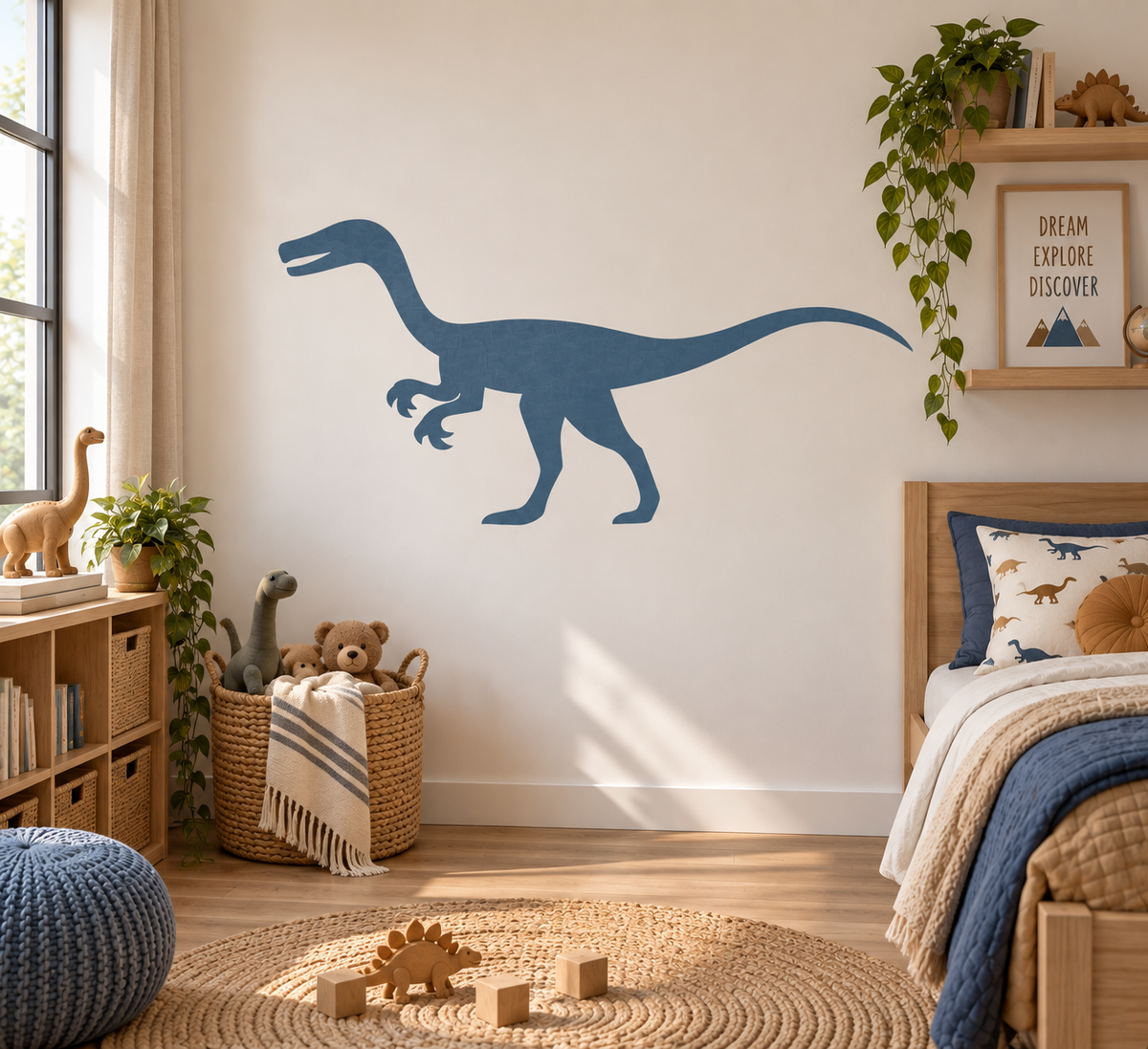 Blue Velociraptor dinosaur stencil painted on a kids bedroom wall with natural wood furniture and dinosaur decor.