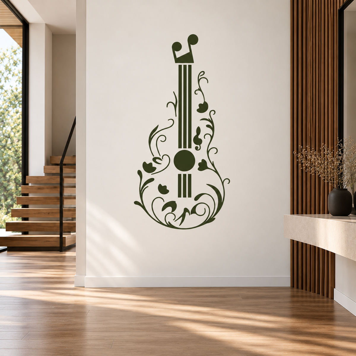 Olive green guitar stencil with elegant floral scrollwork on a white wall in a contemporary hallway with wooden stairs.