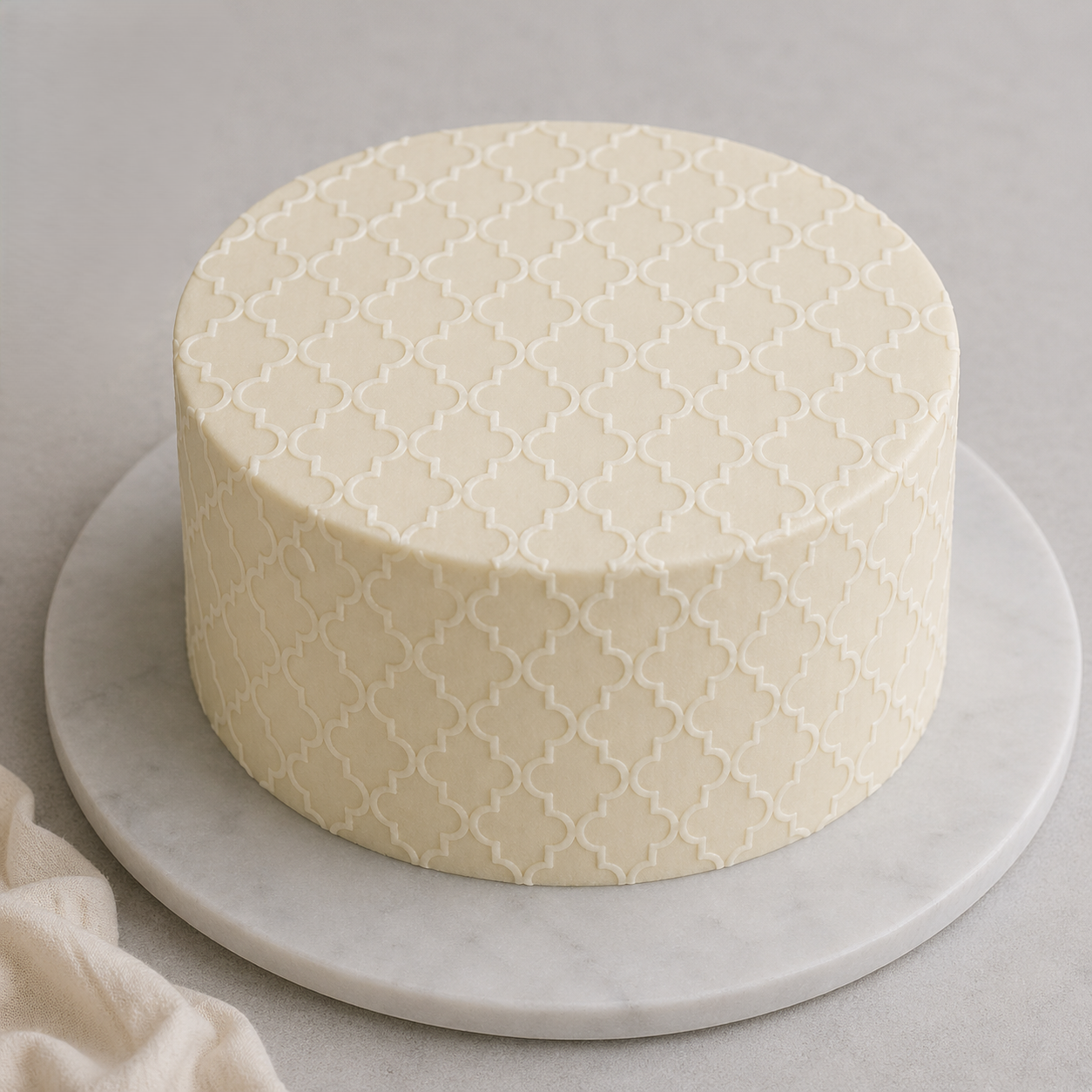 elegant cake stencil geometric pattern covering entire buttercream cake