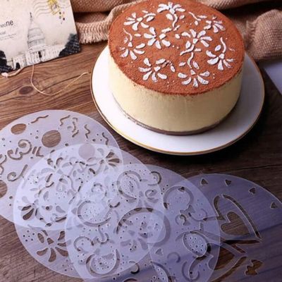 cake stencil set with round patterns used for decorating cake with powdered sugar design