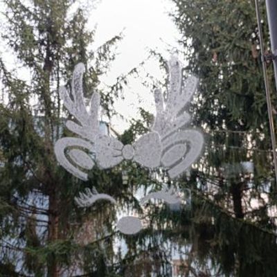 Christmas reindeer face stencil with a bow and eyelashes for window art