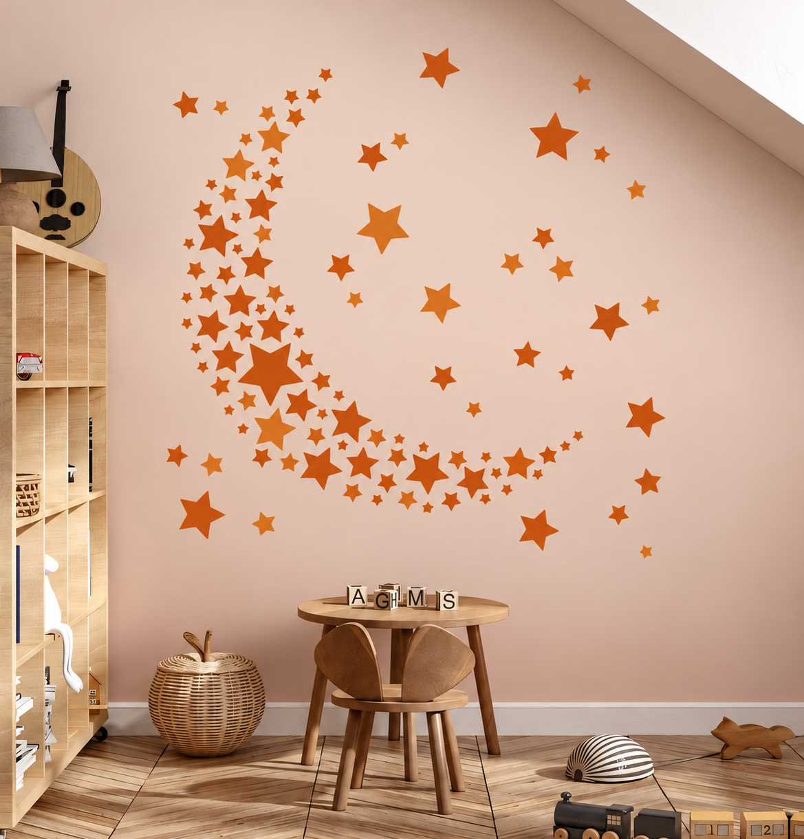 Orange crescent moon and stars wall stencil on a soft neutral wall in a modern kids playroom.