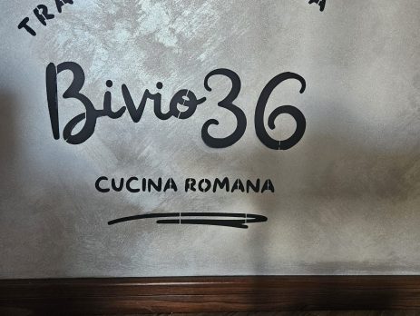 Custom stencil with Bivio36 logo applied on interior wall of Roman pizzeria