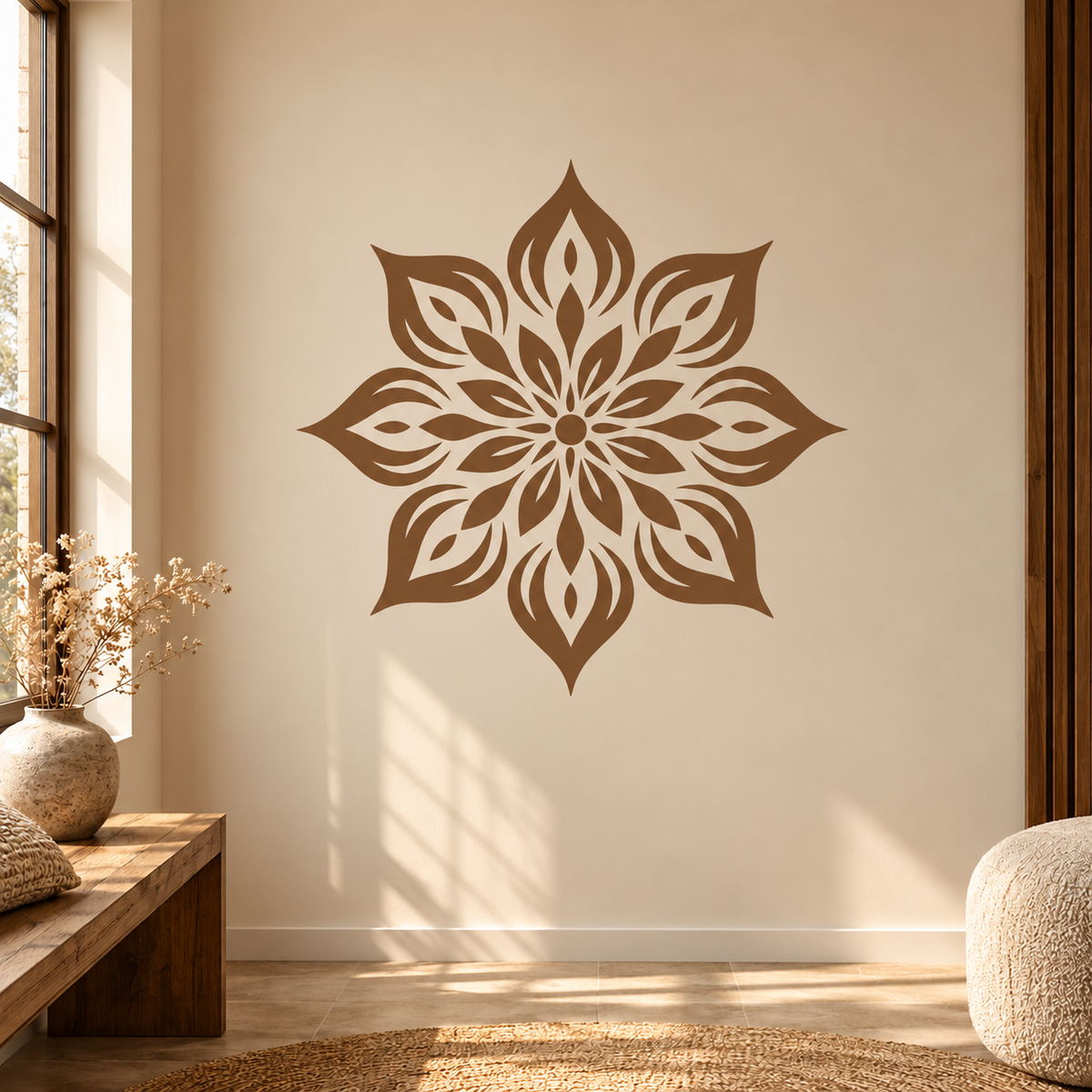 Decorative flower mandala stencil in warm brown on a cream wall in a cozy interior with natural wood furniture.