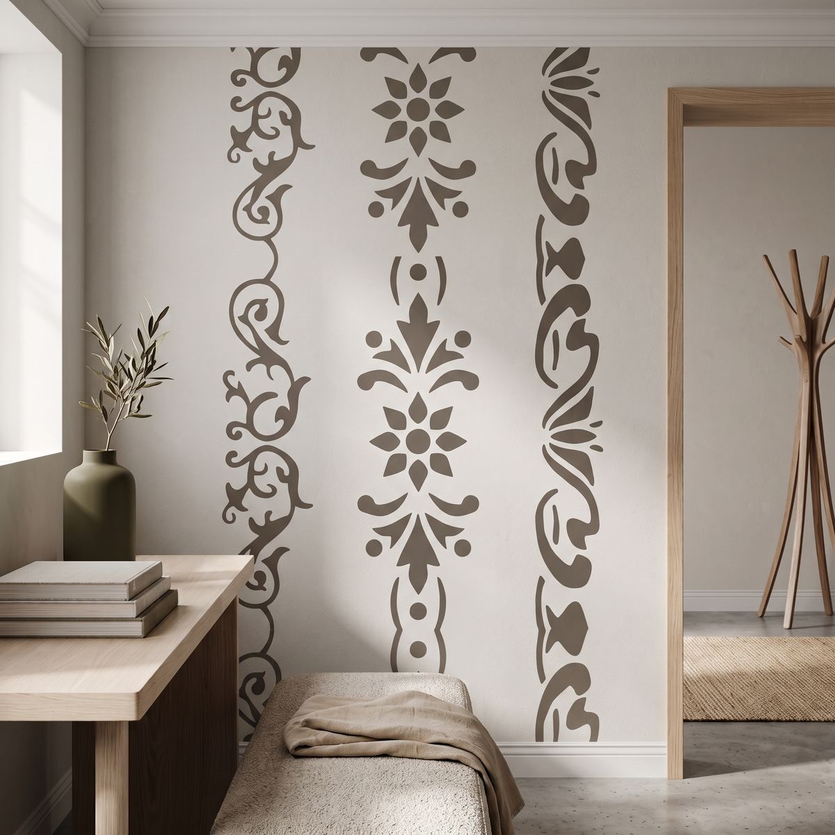 Decorative vertical border stencils with floral motifs used on a modern neutral wall