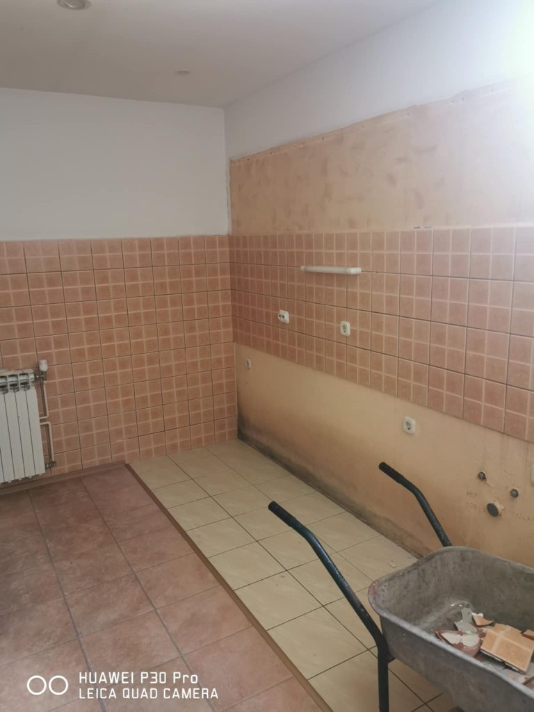 Dining room wall before renovation showing plain surface ready for modern wall stencils application