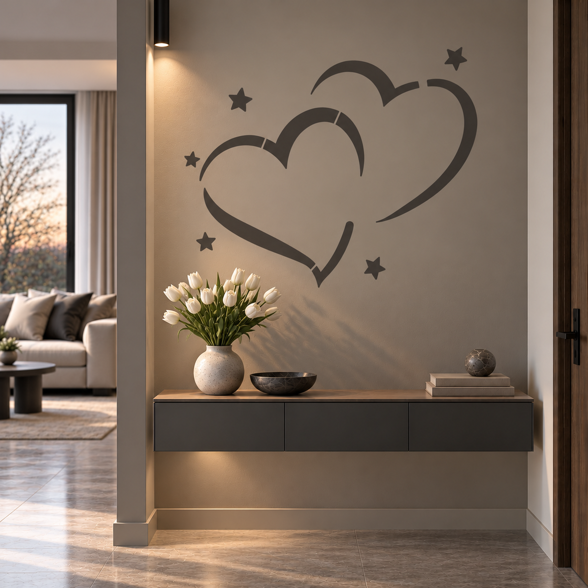 Double Heart Stencil in dark gray with small stars on a taupe wall above a floating console in a modern entryway.