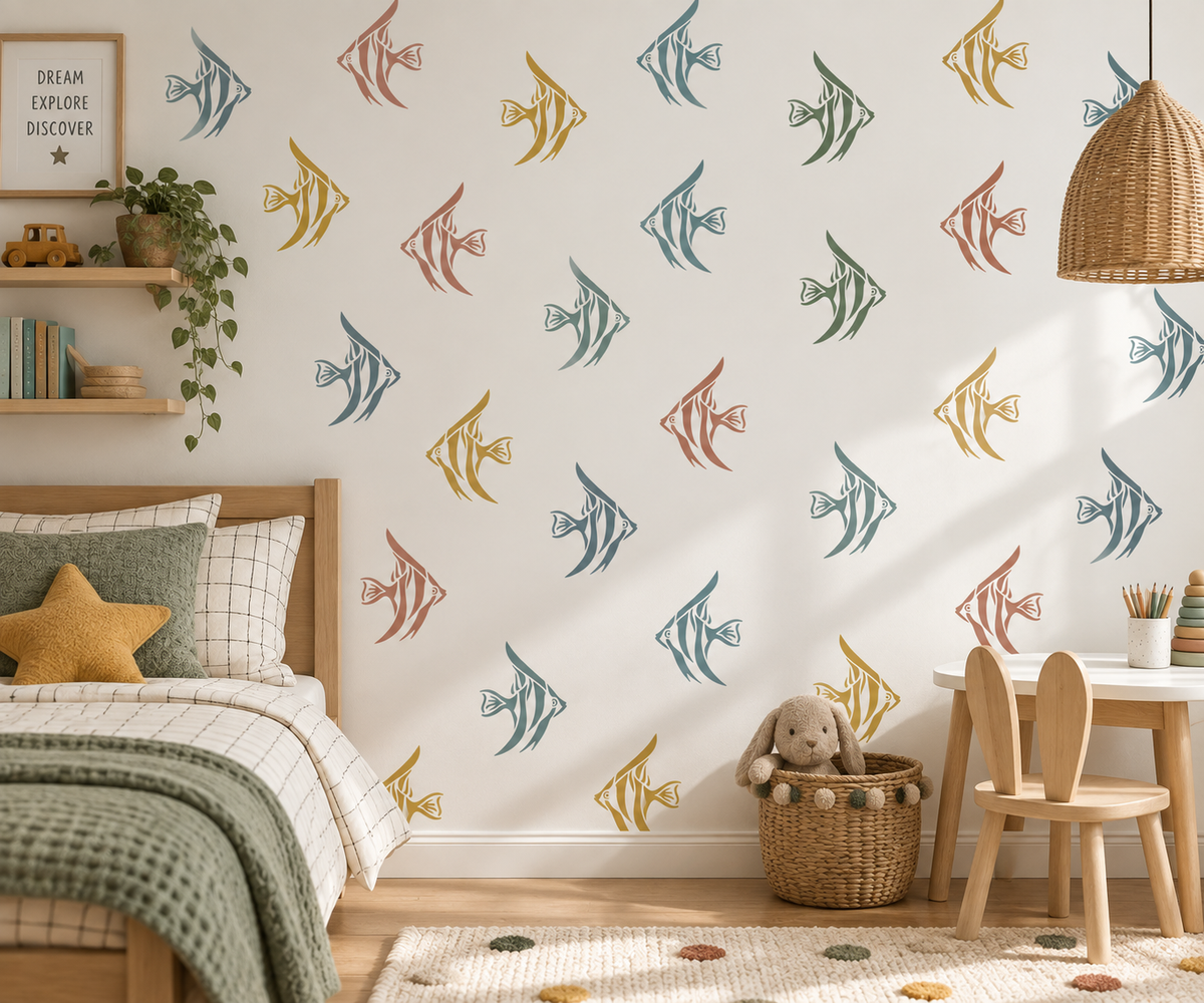 Colorful angelfish silhouette wall stencil pattern in teal, green, mustard and terracotta painted in a cozy kids bedroom for ocean themed nursery wall decor.