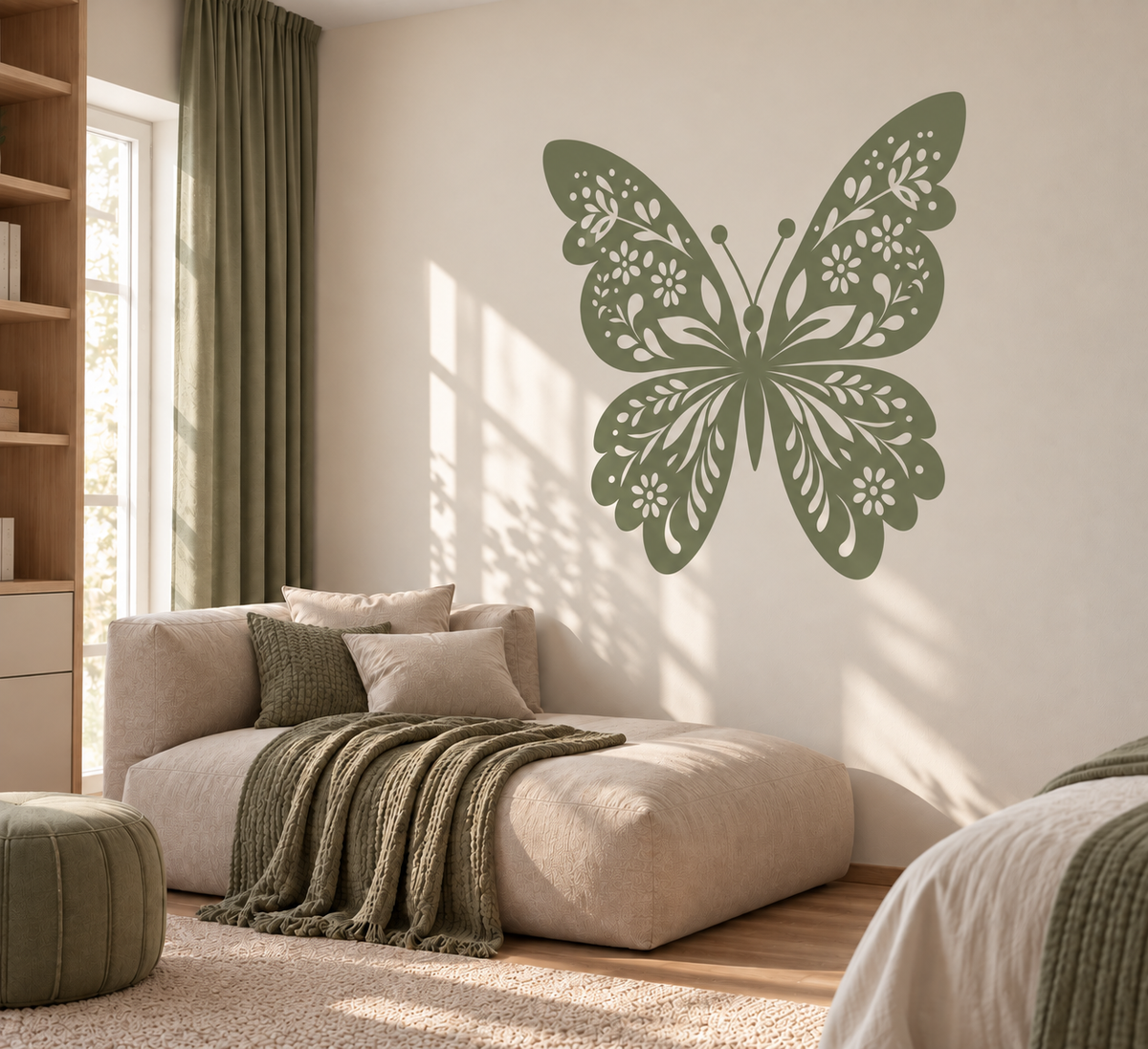 Large sage green floral butterfly wall stencil painted on a neutral wall, creating elegant nature inspired wall decor for a modern bedroom or living room.