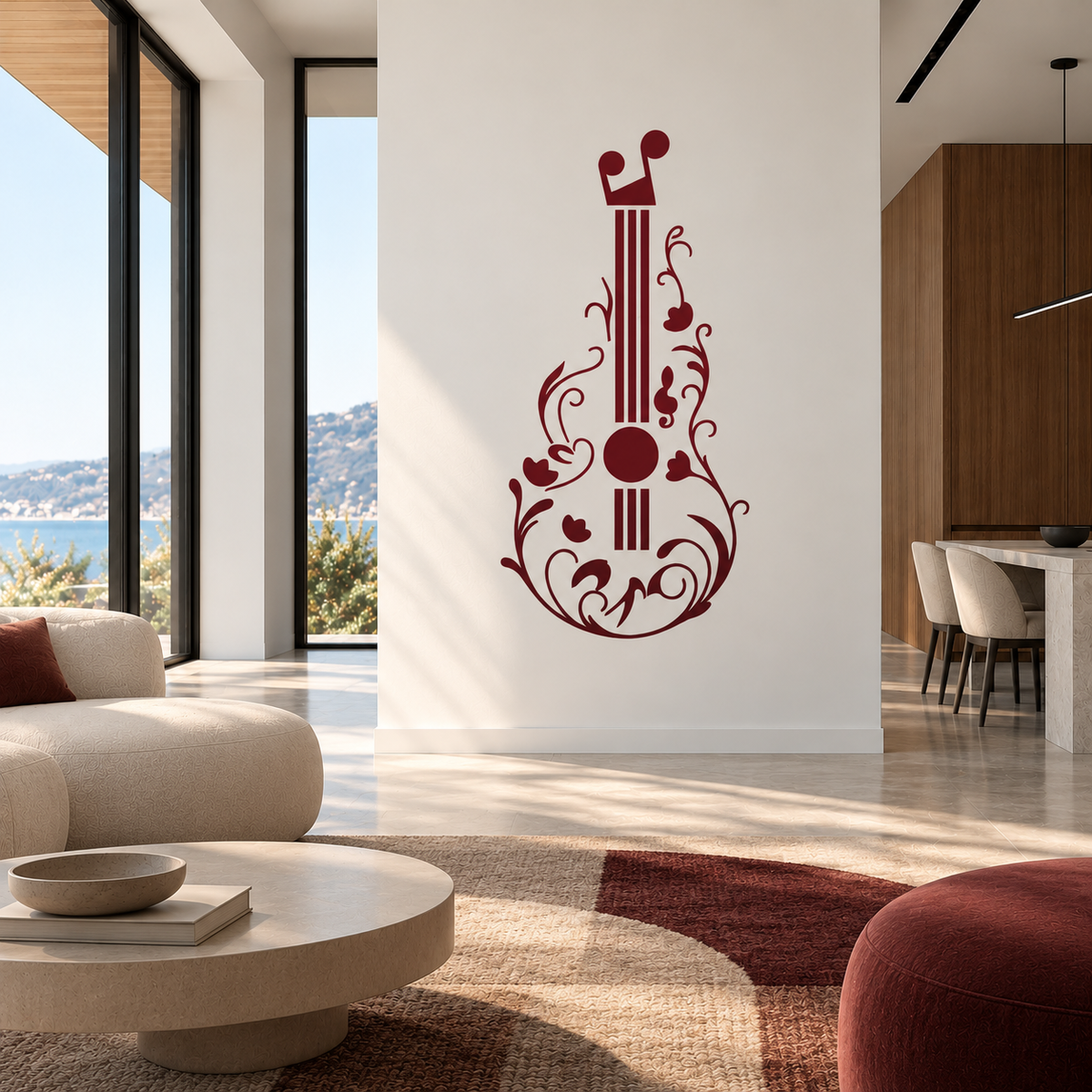Burgundy floral guitar stencil with botanical details on a white feature wall in a bright contemporary living room overlooking the sea.