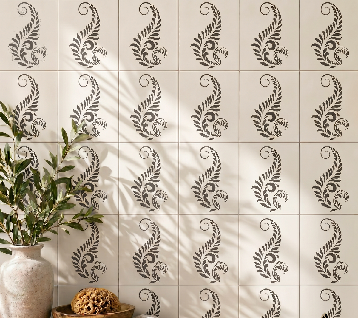 Leaf Tile stencil painted on rustic wooden cabinet doors in a cozy farmhouse interior with botanical decor, natural wood furniture, and modern DIY furniture makeover styling.
