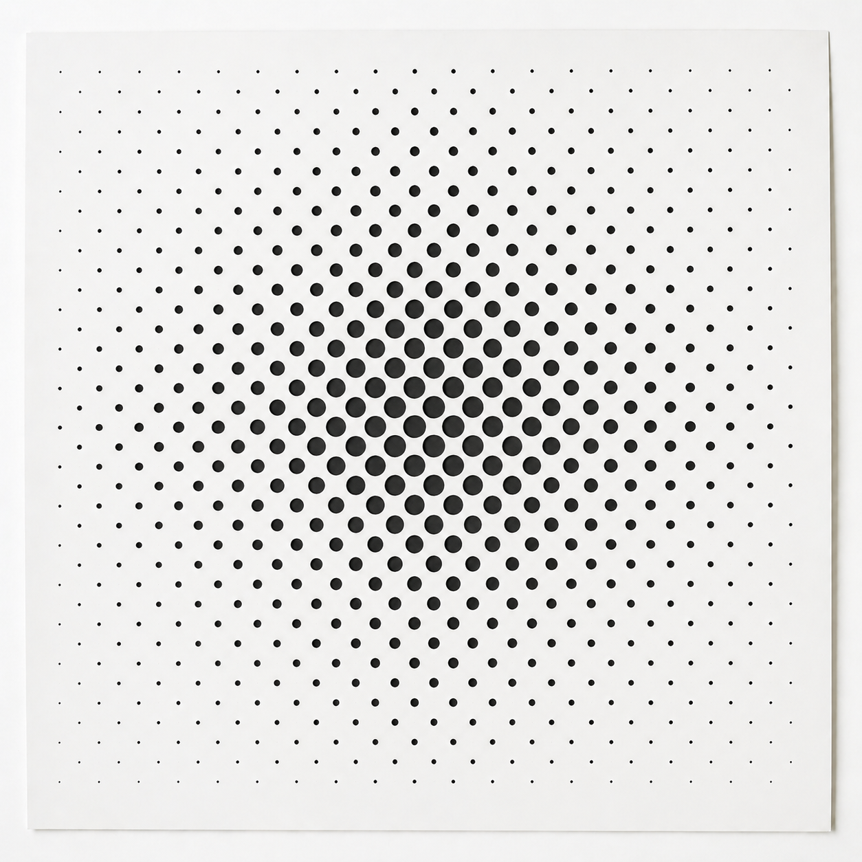 Halftone dot gradient pattern showing variation in dot size and spacing