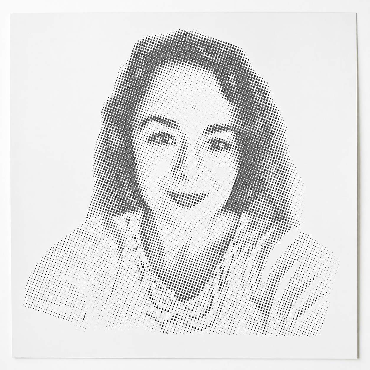 Black and white halftone stencil portrait of a woman created with dots