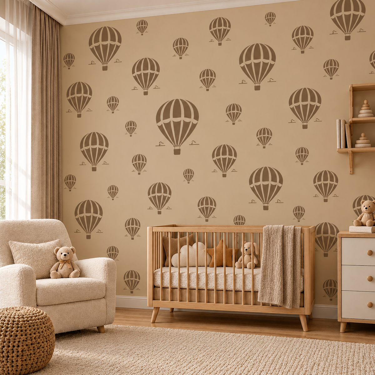 Repeating Hot Air Balloon Stencil pattern in taupe on a beige wall behind a natural wood crib in a neutral nursery.