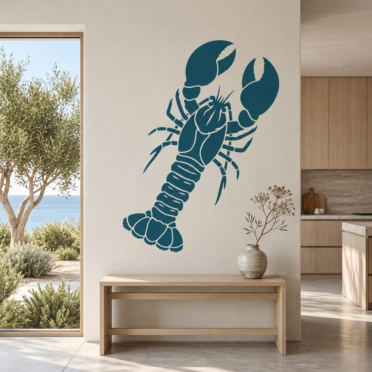 Large teal lobster stencil on a light wall beside a minimalist wood bench in a sunlit coastal kitchen.