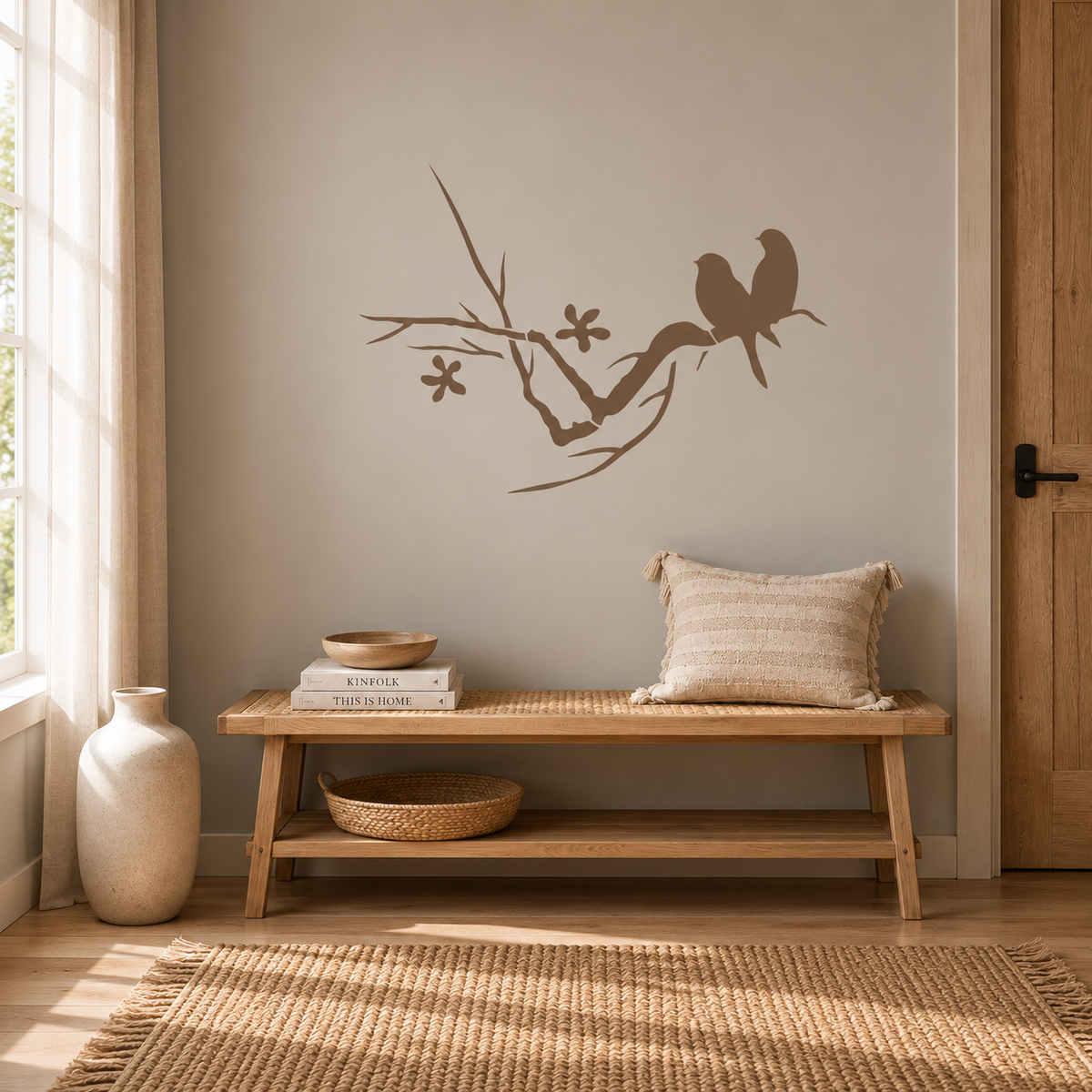 Love Birds Stencil in warm brown with two birds and flowers on a neutral wall in a cozy entryway