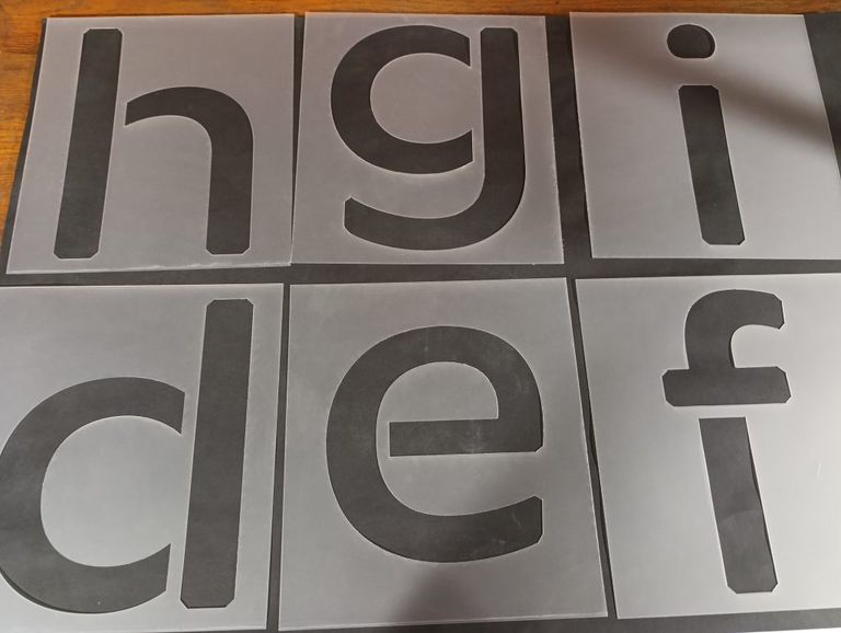 Lowercase letter stencils set featuring clean cut-out alphabet characters for crafting, labeling, and decorative projects.
