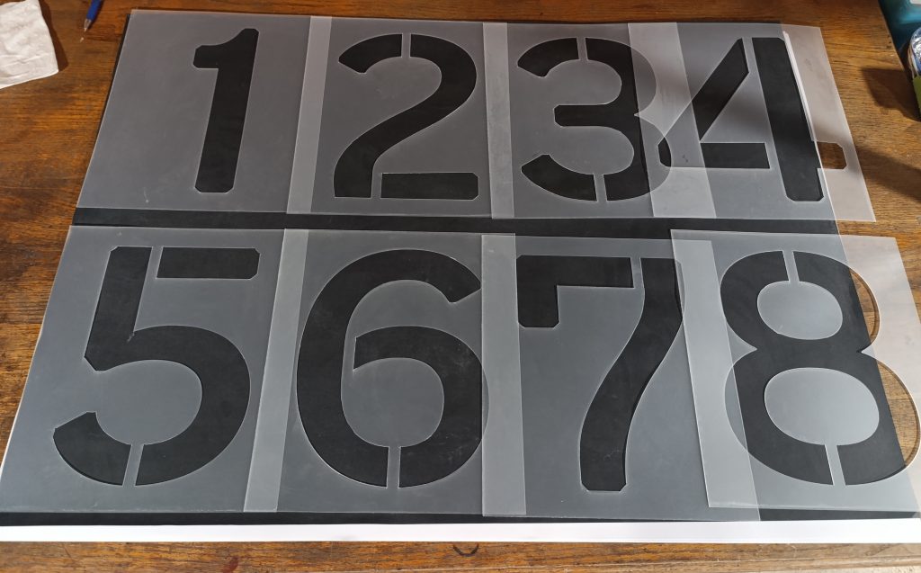 Large-format number stencils with bold cut-out digits designed for clear marking on walls, floors, and industrial surfaces.