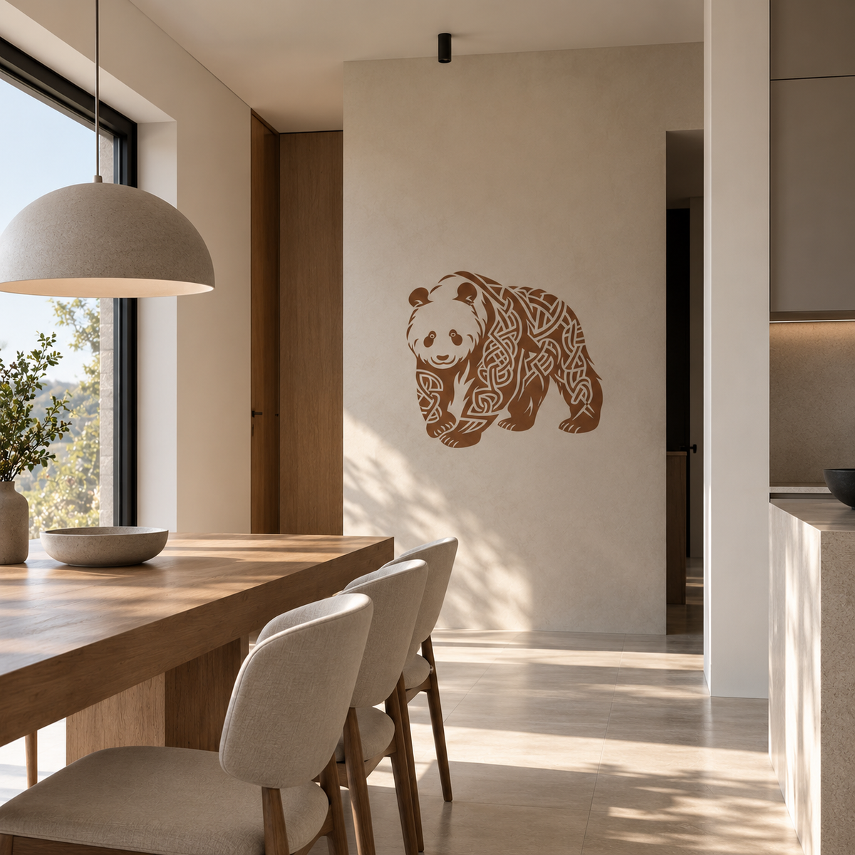 Panda silhouette stencil in a warm brown tone decorating a neutral wall in a bright contemporary dining room.
