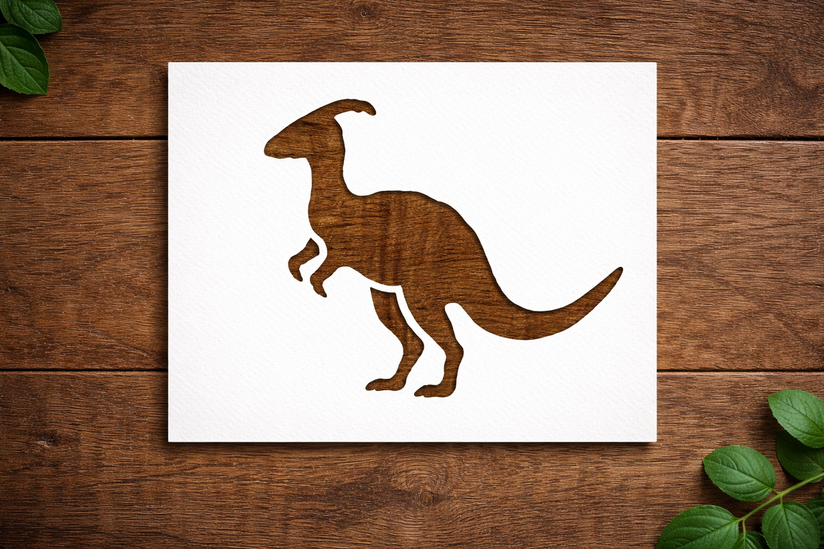 Parasaurolophus dinosaur stencil made from reusable 300 micron Mylar, shown on white stencil sheet placed on wooden background.