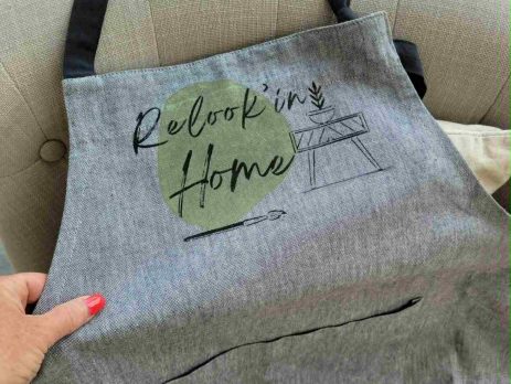 Close-up of cotton fabric with hand-stenciled pattern using textile paint