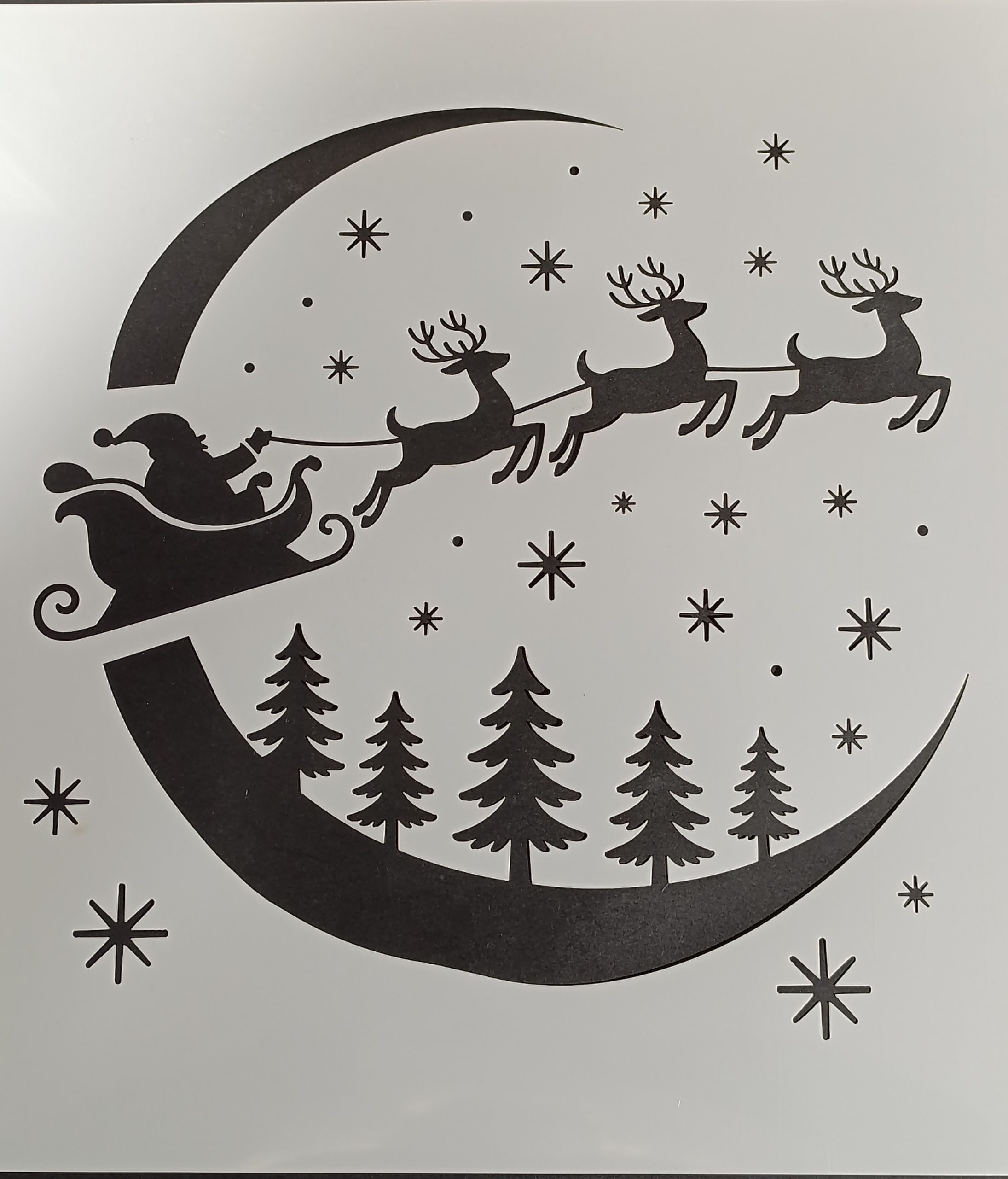 Santa sleigh stencil template featuring a classic holiday silhouette design ready for crafting or window decoration.