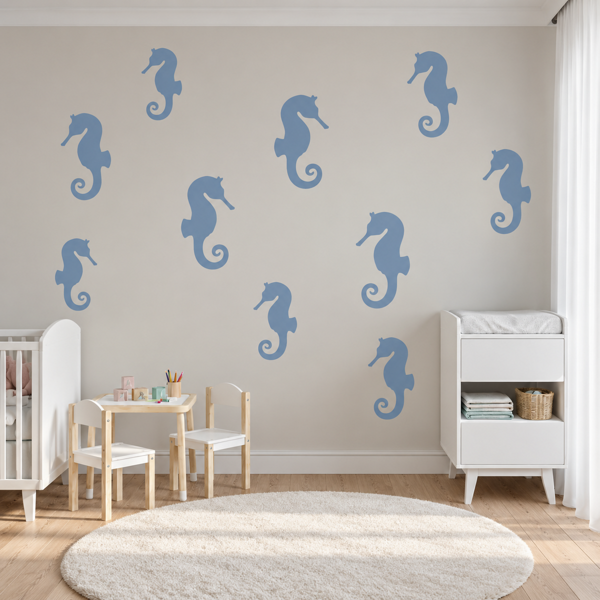 Blue Seahorse Stencil pattern on a neutral wall in a bright modern nursery