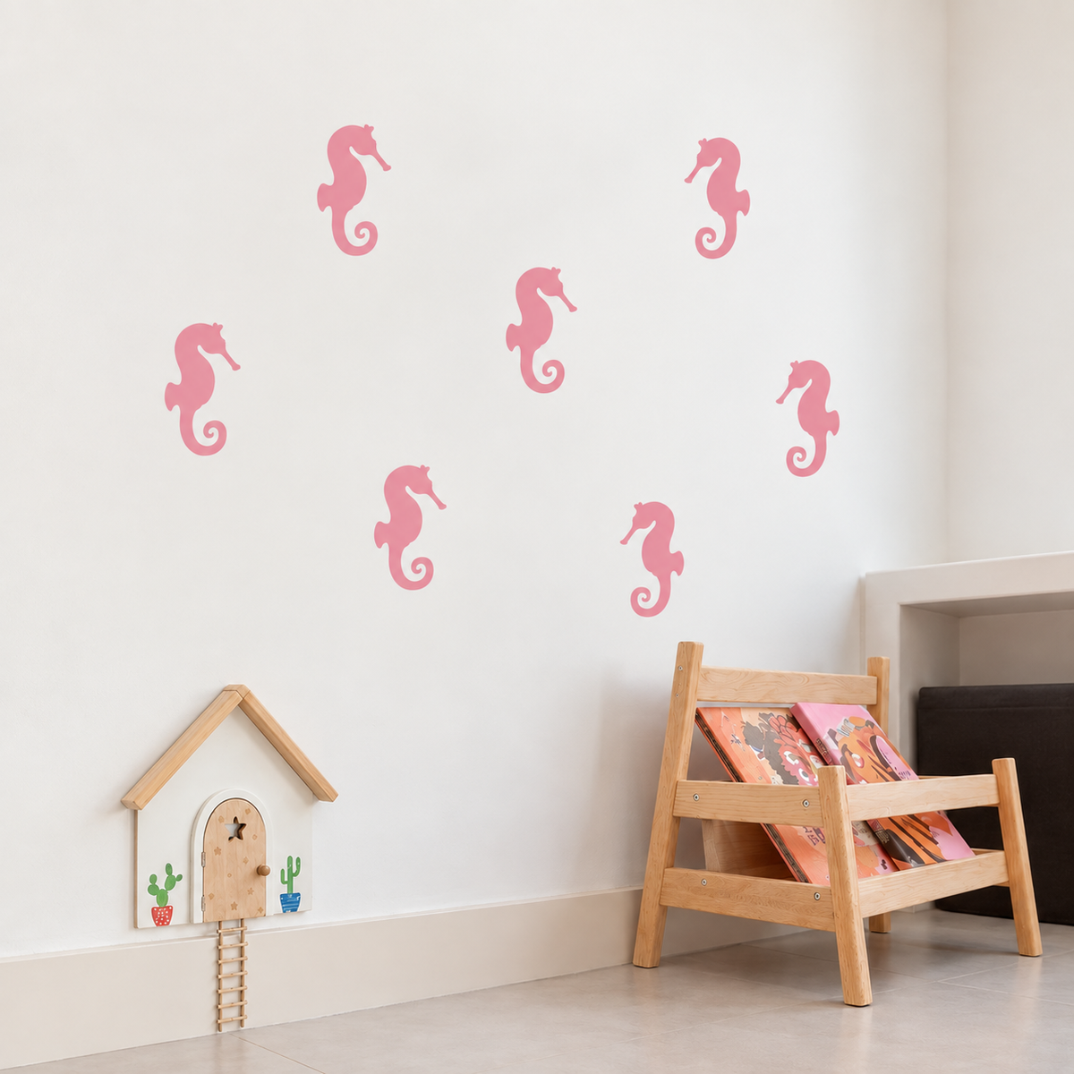 Pink Seahorse Stencil pattern on a white wall in a playful kids room