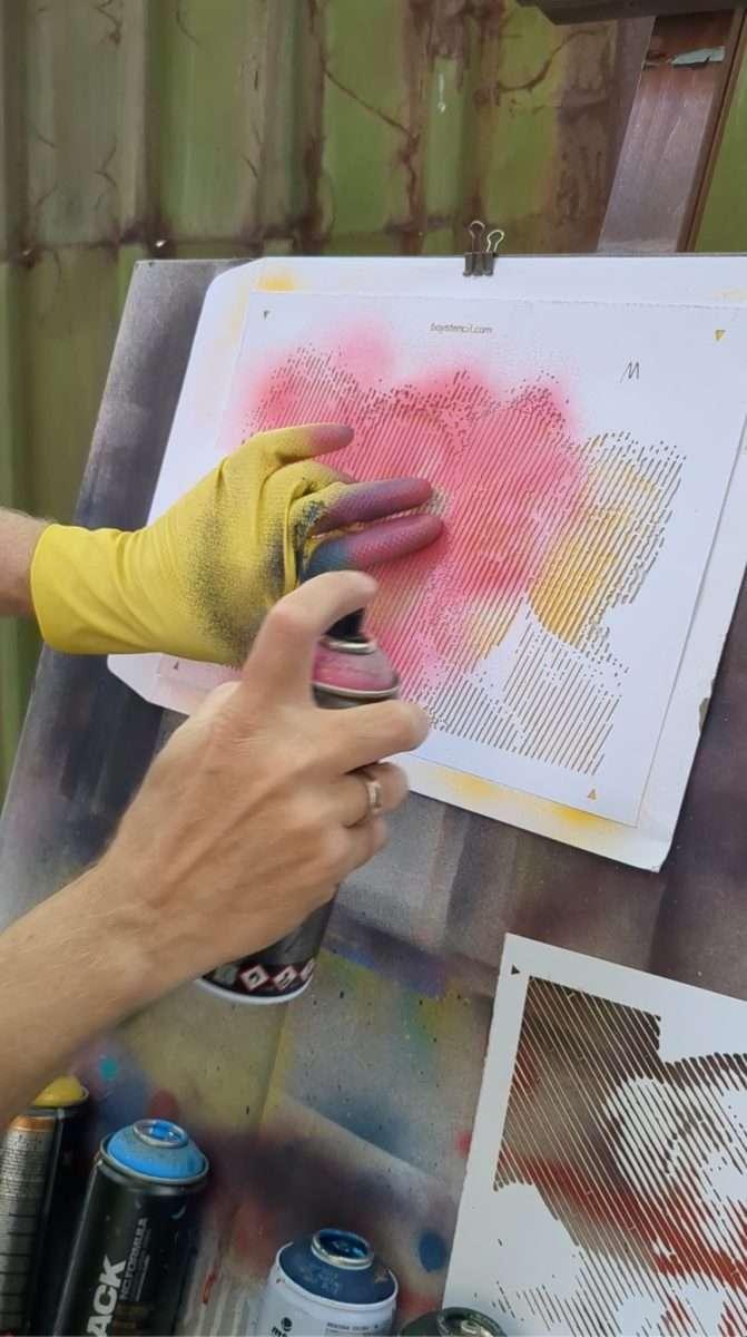 Spray painting a halftone stencil with controlled layers to achieve clean dot or line pattern shading