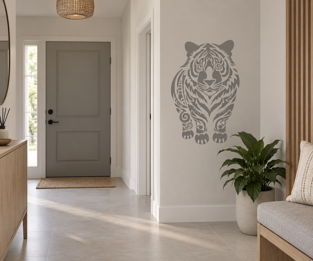 Large gray tiger wall stencil with intricate decorative details in a bright neutral entryway.