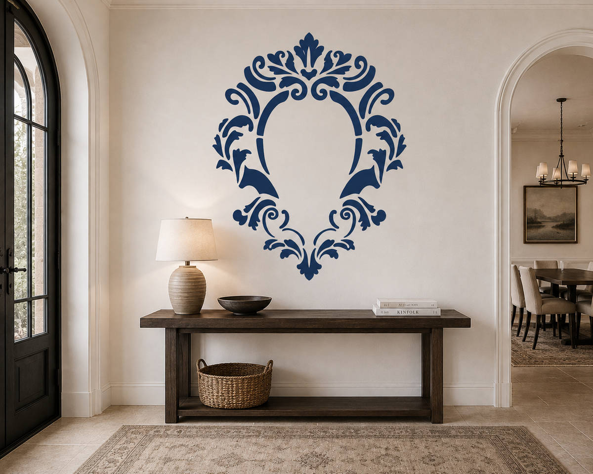 Vintage ornamental frame stencil creating an elegant decorative focal point on an entryway wall