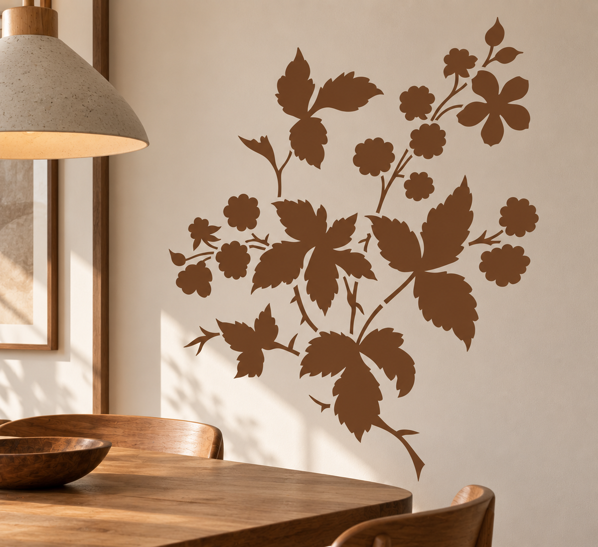 Wild berry branch wall stencil in warm brown featuring leaves, flowers and berries on a neutral dining room wall